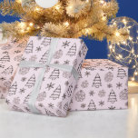 Black and White Trees Snowflakes Pink Christmas Wrapping Paper<br><div class="desc">Introducing our Vintage Blush Christmas Wrapping Paper, a charming blend of timeless elegance and contemporary design. The paper features a Super cute light pink Christmas background that radiates softness and sophistication, reminiscent of a winter's dawn. Against this delicate backdrop, modern black and white Christmas ornaments, snowflakes, and Christmas trees adorn...</div>