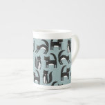 Black and White Tuxedo Cats Bone China Mug<br><div class="desc">Cute black and white bicolor piebald tuxedo cats going about their business. A fun pattern for animal lovers on a mid blue background.
A nice idea for your favourite veterinarian or pet sitter.</div>