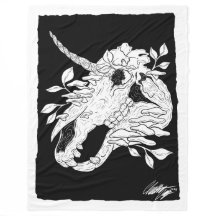 Black and white unicorn skull