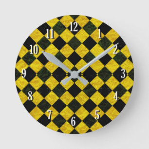 Black and yellow chequered pattern round clock