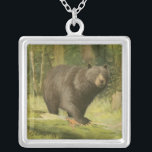 Black Bear Stepping on a Tree Trunk Silver Plated Necklace<br><div class="desc">This fine art print by Oliver Kemp illustrates a brown bear stepping on a fallen tree in a forest. The pastel green colours are calming for the eye and create a nice warm feeling of the awakening nature in the spring. A great addition to any rustic home decor!</div>