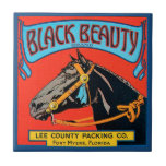 Black Beauty Horse on Red Background Tile<br><div class="desc">This vintage crate label of a black horse on a red background will please any vintage art lover. The colours are very vivid and sharp. Choose this artprint on your product today.</div>