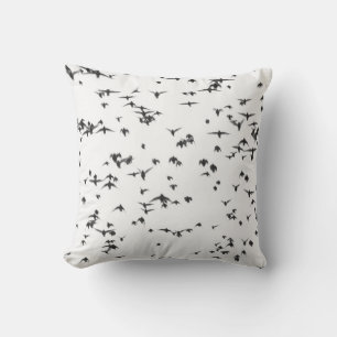 BLACK BIRDS FLYING ON SKY CUSHION