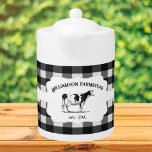 Black Buffalo Plaid Farm Cow<br><div class="desc">Add a rustic touch to your kitchen with this Black Buffalo Plaid Farm Cow Teapot. Teapot design features a farm cow on an elegant tag and custom text for you to personalise with your family name against a gingham pattern background. Additional home decor items available with this design.</div>