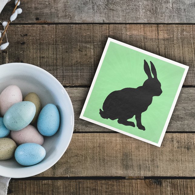 Black Bunny Silhouette Form Tall Ears on Green Napkin (Black sitting bunny rabbit on green paper napkin for spring or Easter.)