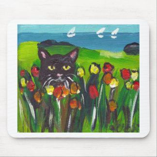 Black cat amongst tulips mouse pad