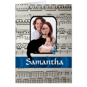 Black cat and butterflies