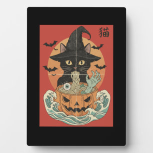 Black cat eats Japanese ramen for Halloween Plaque