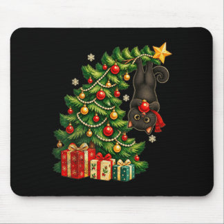 Black cat hanging from christmas tree festive pet mouse pad