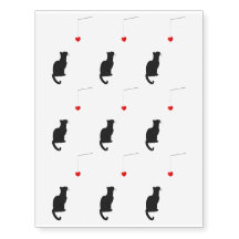 Black Cat Looking At Pendant Heart