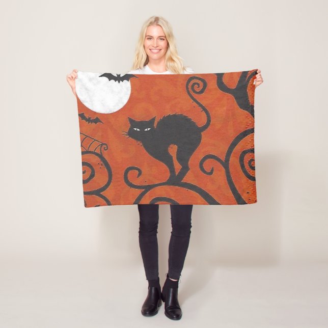black cat orange fleece blanket (In Situ)