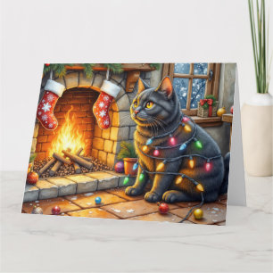 Black Cat Sitting Fireplace with Christmas Lights Card