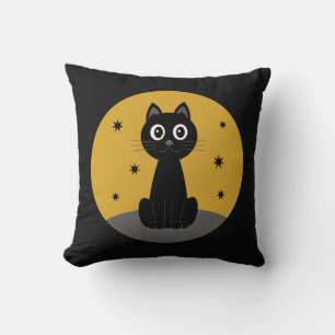 Black cat sitting watching the stars cushion