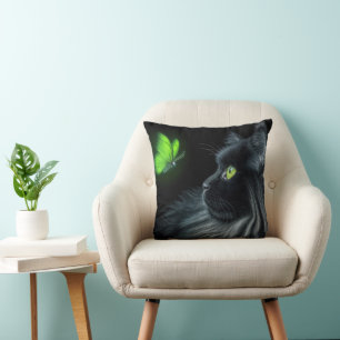 Black Cat Staring At a Glowing Green Butterfly Cushion
