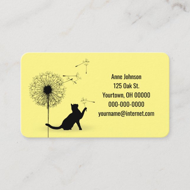 Black cat with dandelion on yellow business card (Front)