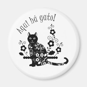 Black cat with flowers and Portuguese expression Magnet