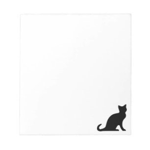 Black cat writing note pads Silhouette of kitten