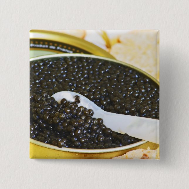 Black caviar and a spoon of mother-of-pearl to 15 cm square badge (Front)