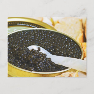 Black caviar and a spoon of mother-of-pearl to postcard