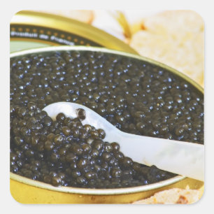Black caviar and a spoon of mother-of-pearl to square sticker