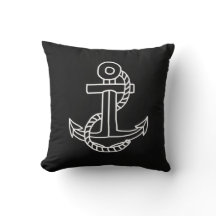 Black chalkboard nautical pillow and white anchor.