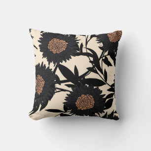 Black chamomile, gerbera: cream background. cushion