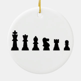 Black chess pieces on white ceramic tree decoration