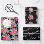 Black Christmas Wrapping Paper Poinsettia<br><div class="desc">This black Christmas wrapping paper features a trendy pattern of colourful watercolor poinsettia and script typography with the words "Merry Christmas". Use the template fields to add your personalised text or leave as is. A cute yet rustic choice for festive holiday gift wrapping and unique Christmas gifts. Original watercolor art...</div>