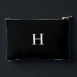 Black Classic Elegant Monogram Accessory Pouch<br><div class="desc">This Classic Elegant Modern Minimalist Black and White Monogram Initial combines timeless sophistication with a modern twist. Featuring a sleek black and white color scheme, it highlights a personalized monogram for a unique, custom touch. Perfect for elevated events, this exudes chic and classy elegance. Personalize it for your home, wedding,...</div>