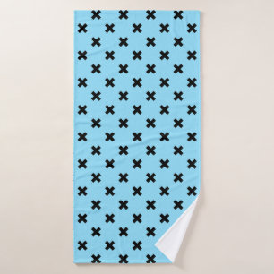 Black cross stitches on baby blue bath towel