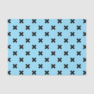 Black cross stitches on baby blue tissue paper