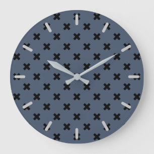Black cross stitches on blue-grey large clock