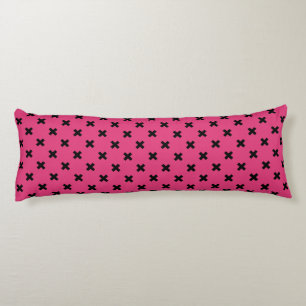 Black cross stitches on fuchsia body cushion