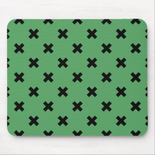 Black cross stitches on green mouse pad