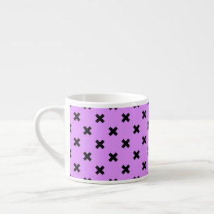 Black cross stitches on lilac espresso cup