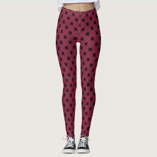 Black cross stitches on mulberry leggings