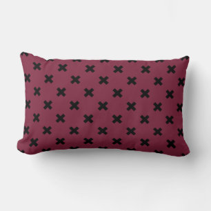 Black cross stitches on mulberry lumbar cushion