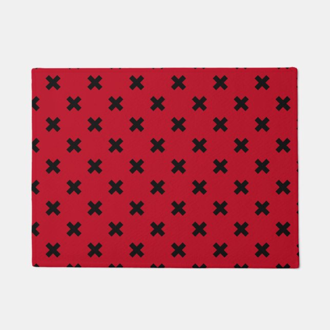 Black cross stitches on red doormat (Front)