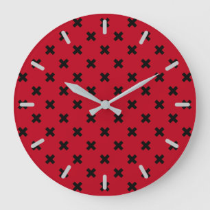 Black cross stitches on red large clock