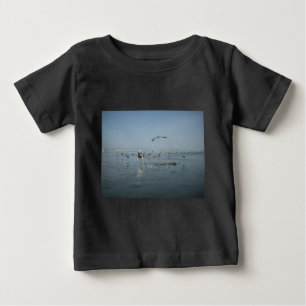 Black Crow and White Cranes: A Contrast in Nature Baby T-Shirt