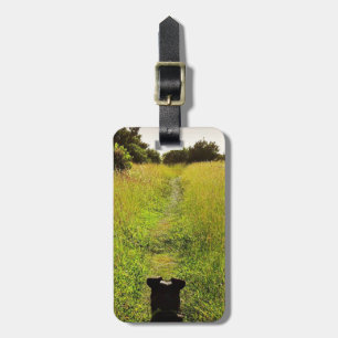 Black Dog Leads Way Along Green Hiking Trail Luggage Tag