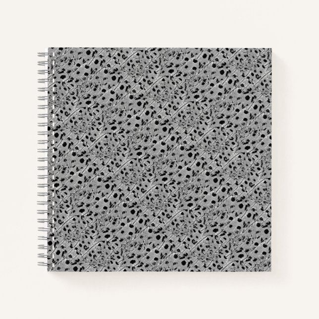Black Dotted Spiral Notebook (Front)