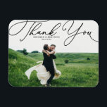 Black Elegant Handwritten Script Photo Wedding Magnet<br><div class="desc">Celebrate your love and show gratitude with our customisable photo wedding thank you magnet! This unique keepsake is perfect for reminding your loved ones of your special day while expressing your heartfelt thanks in a memorable way. It features an elegant white script. Personalise by adding your photo and details. This...</div>