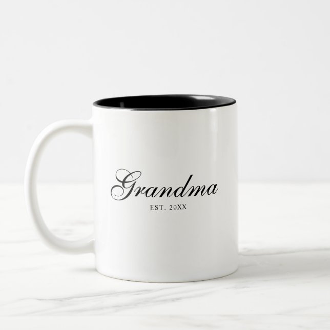 Black Elegant Script Established Grandma Two-Tone Coffee Mug (Left)