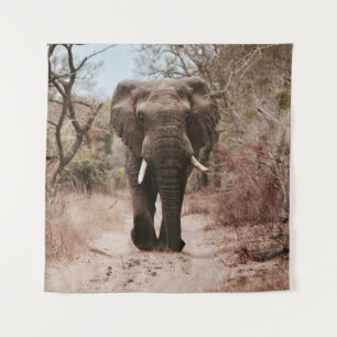 BLACK ELEPHANT WALKING ON BROWN SAND TAPESTRY