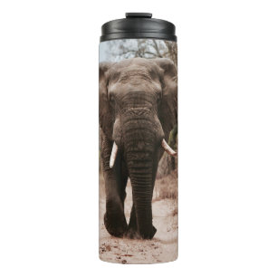 BLACK ELEPHANT WALKING ON BROWN SAND THERMAL TUMBLER