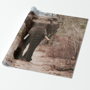 BLACK ELEPHANT WALKING ON BROWN SAND WRAPPING PAPER