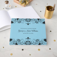 Black floral border on light blue background