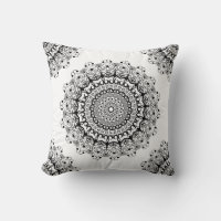 Black floral mandala on a white background