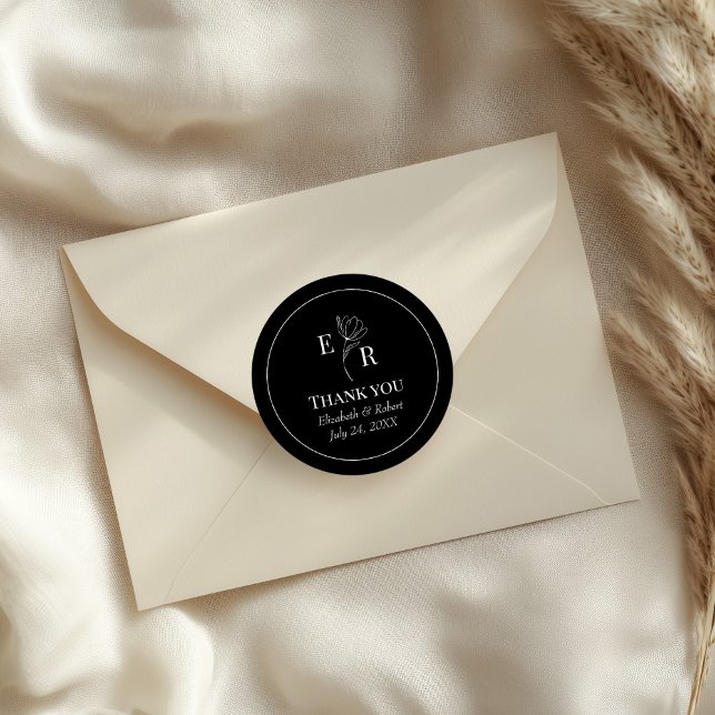 Black Floral Monogram Wedding Thank You Classic Round Sticker (Black Floral Monogram Wedding Thank You Classic Round Sticker on an elegant wedding envelope.)